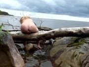 BIG ASS OUTDOOR ON A LOG