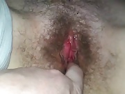 her wet pussy making her moan loud