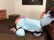 'Frog tied in unicorn onesie cum on tits'