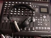 Busty brunette chick gets fucked by two music producers