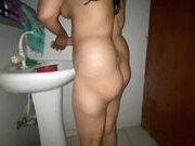 A beautiful girl takes a shower