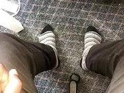 Young African feet out in socks in the office