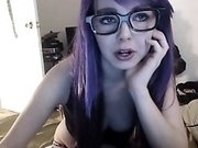Geeky young babe with violet hair teases her shaved pussy w