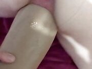 Getting fucked by a huge dildo strapon