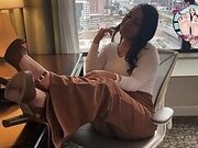 Sexy Realtor Gives Her Client a Footjob