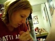 Horny blonde college girl giving blowjob on student cam