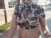 shows tits while walking around town