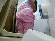 Camera catches nurse pissing in hospital bathroom