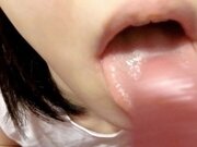 'Cute Asian girl chokes on cum after a blowjob with a huge cumshot'