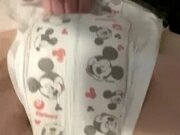 'Diaper girl wets baby diaper while â€ Masturbating and leaks'
