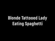 Blonde Tattooed Lady Eating Spaghetti