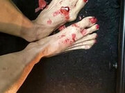 Candle light on tiny feet with sexy toes