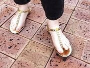 Sexy natural feet in gorgeous gold sandals