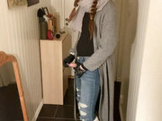 Femboy in tight jeans and hunter boots