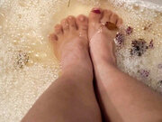 Washing My Feet with Rose Petals and Herbs After a Hard Day of Work