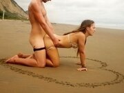 'Hot teen girlfriend surprises her boyfriend with her wet pussy on a public beach!'