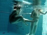 'Hot cute sexy kissing lesbians in the pool'