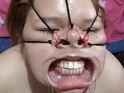 Fucking her face with a beautiful bondage style