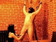 'Mistress tortures slave: electric current, spanking, anal plug, footfetish'