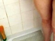 MILF slut shaking arse in shower