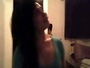 Brunette webcam girl shows her tits and fingers her pussy