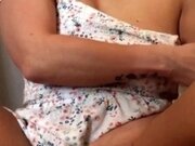 'Cute girl in sundress masturbates with mini  vibrator, massages clit to orgasm'