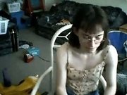 Fucking ugly four eyed chick shows her tiny tits for free
