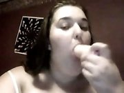 Amateur pale skin fat slut on webcam is playing with a dildo again