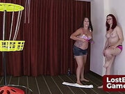 Two horny milfs play a Strip Disc Golf in the living room