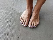 Showing off our feet and pedicures while wet