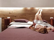 Blonde mature Selena with feet posing and bed games